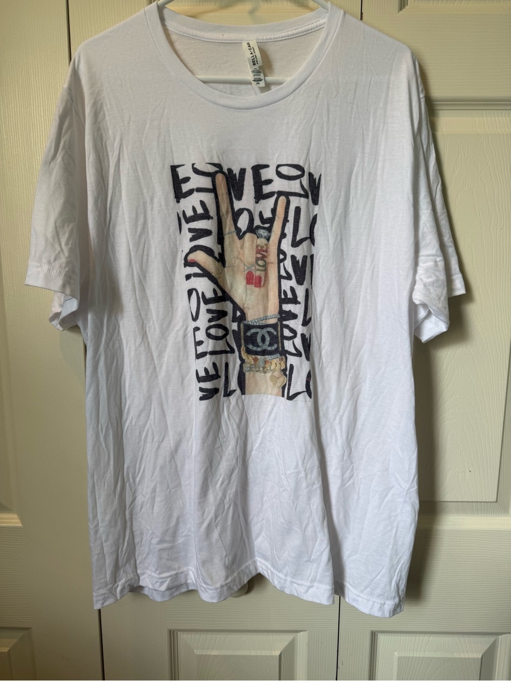 # White 2X Short Sleeve Tee with Graphic Hand and Chanel Bracelet Motif